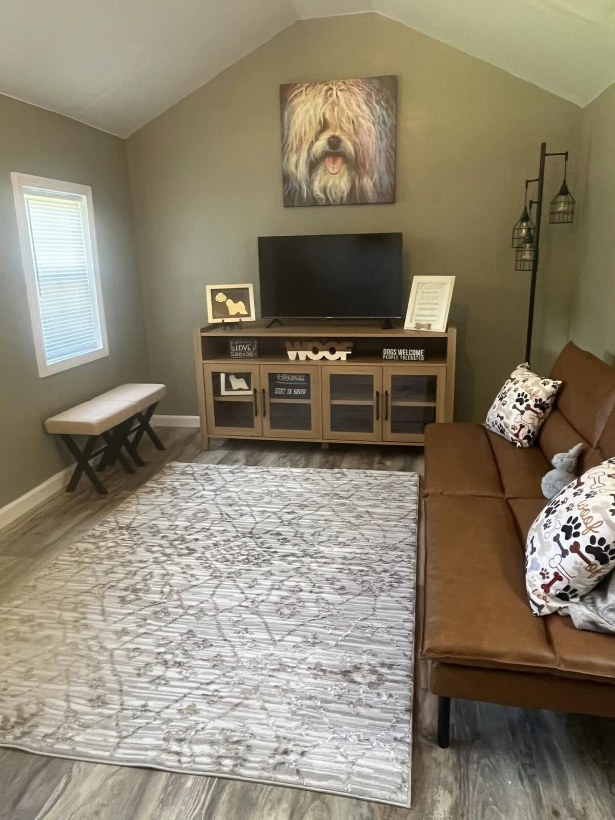 Living room with dog painting
